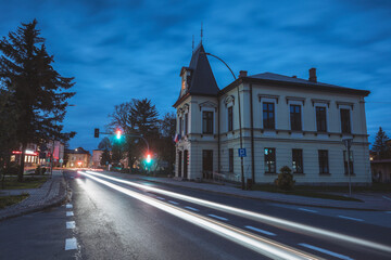 Fototapeta na wymiar Lesko town hall at evening