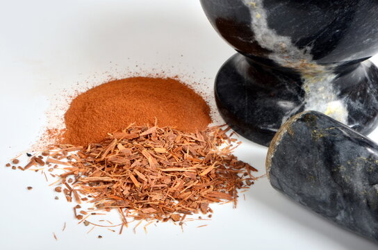 Catuaba bark and catuaba powder on white background. Natural herbal tea from Catuaba tree bark, natural aphrodisiac from Brasilia