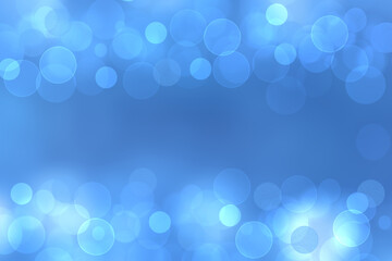 Abstract blurred festive delicate winter christmas or Happy New Year background with shiny blue and white bokeh lighted circles and bubbles. Space for your design. Card concept.