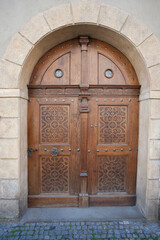 Fototapeta na wymiar Wooden closed door in Prague; Czech Republic