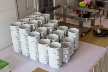 Lots of tea cups , catering on a banquet. Group of coffee cups in caf&eacute; bar