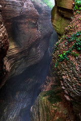 Canyon and waterfall at Orrido di Bellano in Italy.