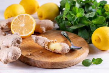 Peeled ginger root on a cutting board