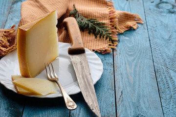 Portion of cured sheep cheese
