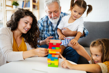 Happy family playing at home and having fun together.