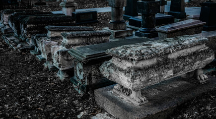 Tombstones at the old Christianity cemetery in Moscow, Russia. Necropolis of the Donskoy Monastery