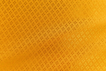 Gold fabric silk texture for background.