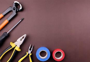 Various tools on brown background