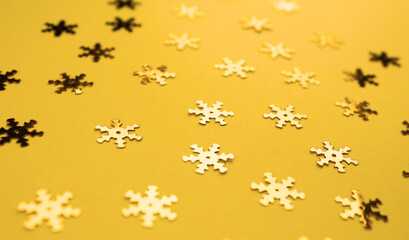 Small snowflakes on yellow background