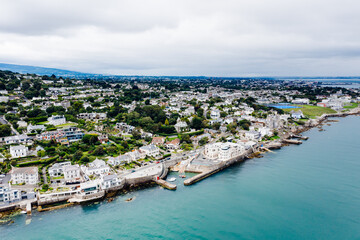 Fototapeta na wymiar Aerial capture of Coliemore Harbour during a cloudy day