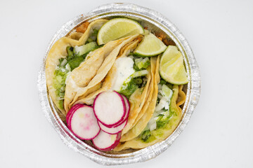 Tacos Stuffed into an Aluminum Takeout Container