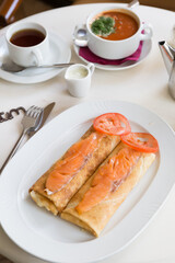 Crepe pancakes with salmon and potato