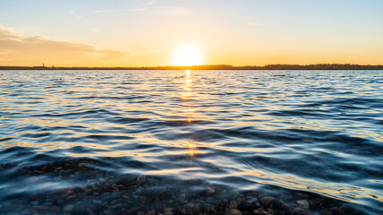 Fototapeta na wymiar Romantic sunset at a lake