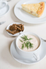 White stylish cream soup with croutons