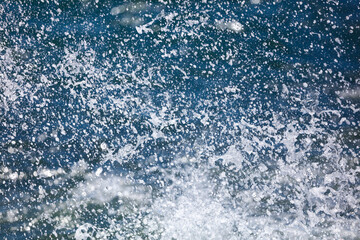 Fototapeta na wymiar Splashing water in the sea as an abstract background.