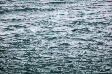 The smooth surface of the sea.
