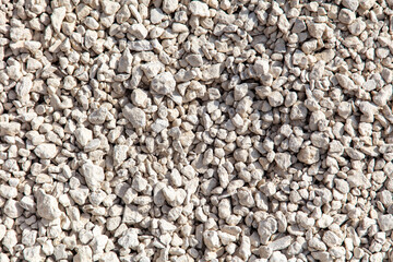 Stone gravel at a construction site as a background.