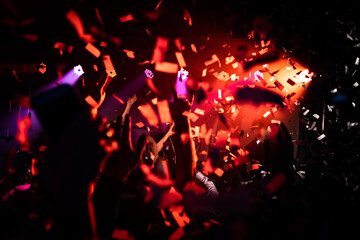 Fototapeta na wymiar Party with confetti at night club