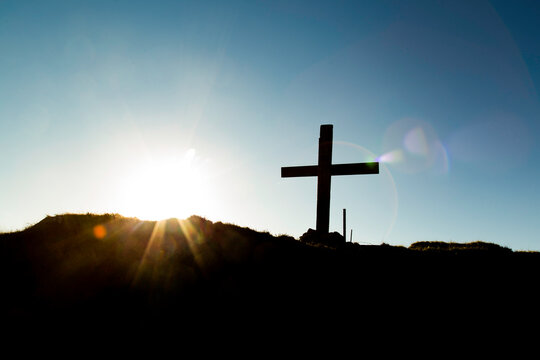 Low Angle View Of Silhouette Cross Against Sky