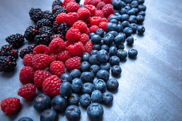 berries mix on an abstract gray background