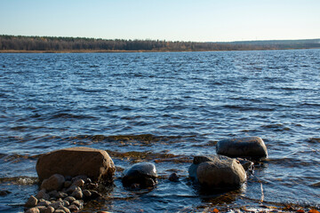 Wet stones on the banks of the River Vuoksa, Russia