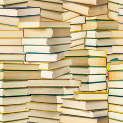 Stack of books and textbooks, seamless pattern for the background.
