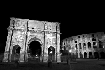 
The monuments of rome in black and white at night

