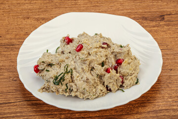 Vagan dietary cusine - mutabal with granet seeds