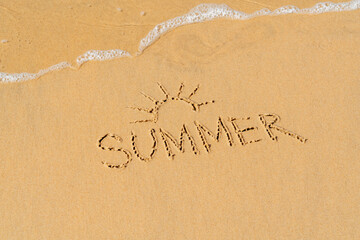 Sun, palm and the inscription summer on the sea sandy beach