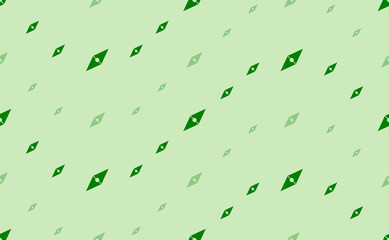 Seamless pattern of large and small green compass symbols. The elements are arranged in a wavy. Vector illustration on light green background