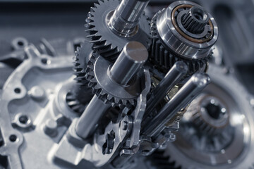 Fototapeta premium repair of a gearbox in a car workshop. the insides of the manual transmission. Close up