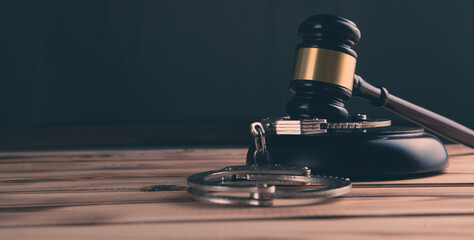 Fototapeta na wymiar Legal law concept image - gavel and handcuffs