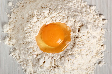 Pile of flour with egg on top