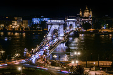 Aerial view of the traffic in the chain bridge in Budapest, Hungary at night.