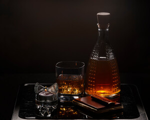 Whiskey set with candle flame