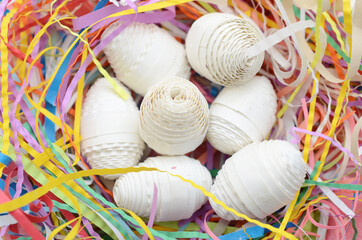 Easter eggs in colorful origami paper, background