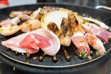 Raw beef on grille for barbecue Japanese style or yakiniku
