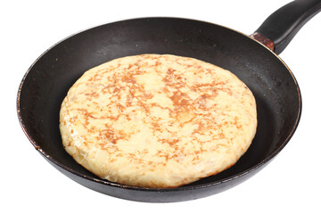 Spanish omelette in frying pan. Isolated with clipping path.