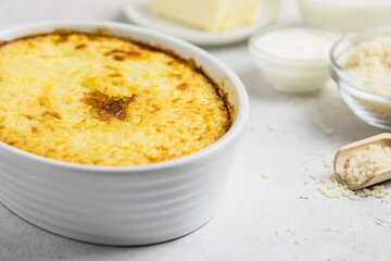 Stuffed rice casserole in a baking dish. Space for text.