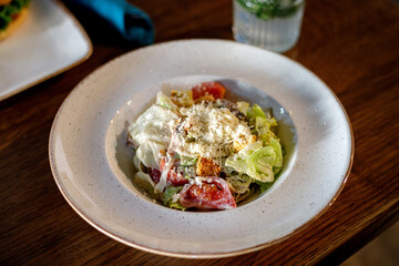 Fresh Caesar salad on a plate
