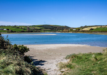 Summer on the sandy beaches of West Cork Ireland with beautiful Blue water in the background.