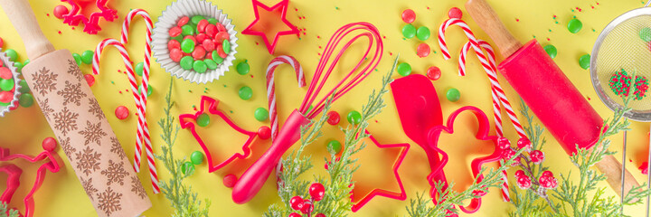 Christmas Baking UtensChristmas Baking Utensils and ingredients. Confectioner or Baker Workplace, with Utensils and accessories for making festive Christmas sweet cookies, cakes. Brils and ingredients