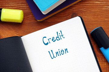 Financial concept meaning Credit Union with phrase on the piece of paper.