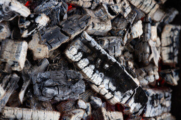 embers close-up in a charcoal grill for barbecue and grilling outdoors