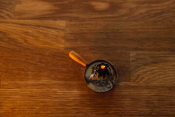 incense candle on wooden table