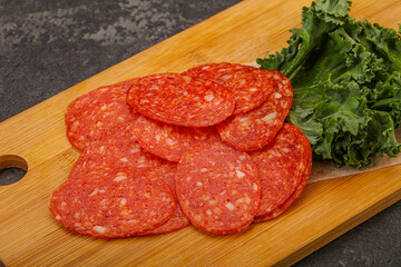Italian spycy pepperoni sausage slices