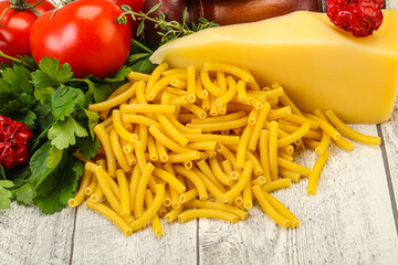 Italian pasta raw Maccheroni for cooking