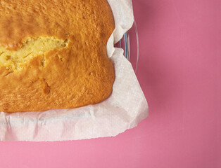 homemade sponge cake, on pink background
