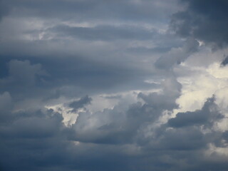 Beautiful multi-colored sky with a cloud before a thunderstorm and rain in autumn in Israel close-up.