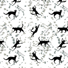 Black cats on a background of splashes and springs, seamless background for gifts and children's fabrics